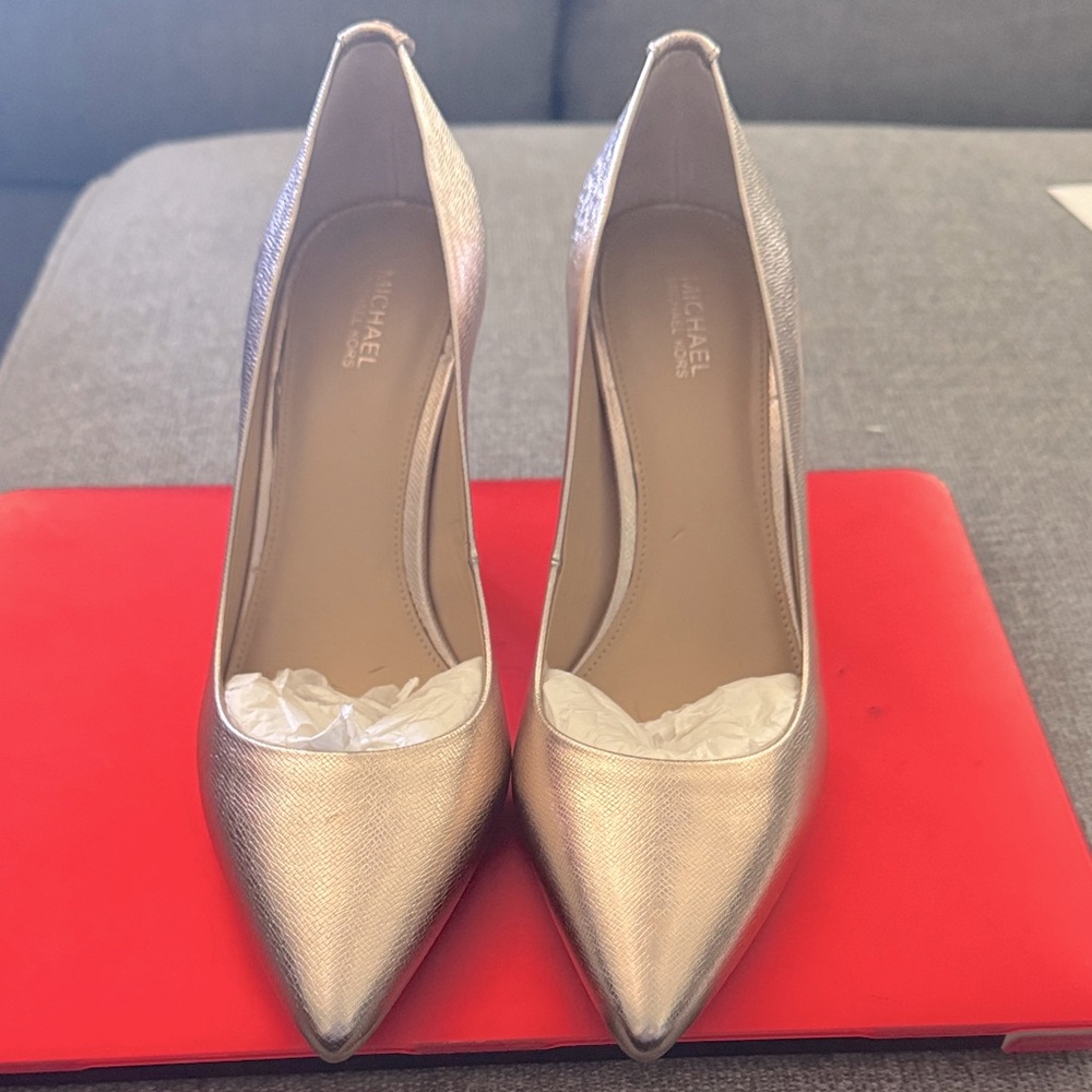 Brand new Michael Kors rose gold. High heels. No box. 3 1/4 heel. P4